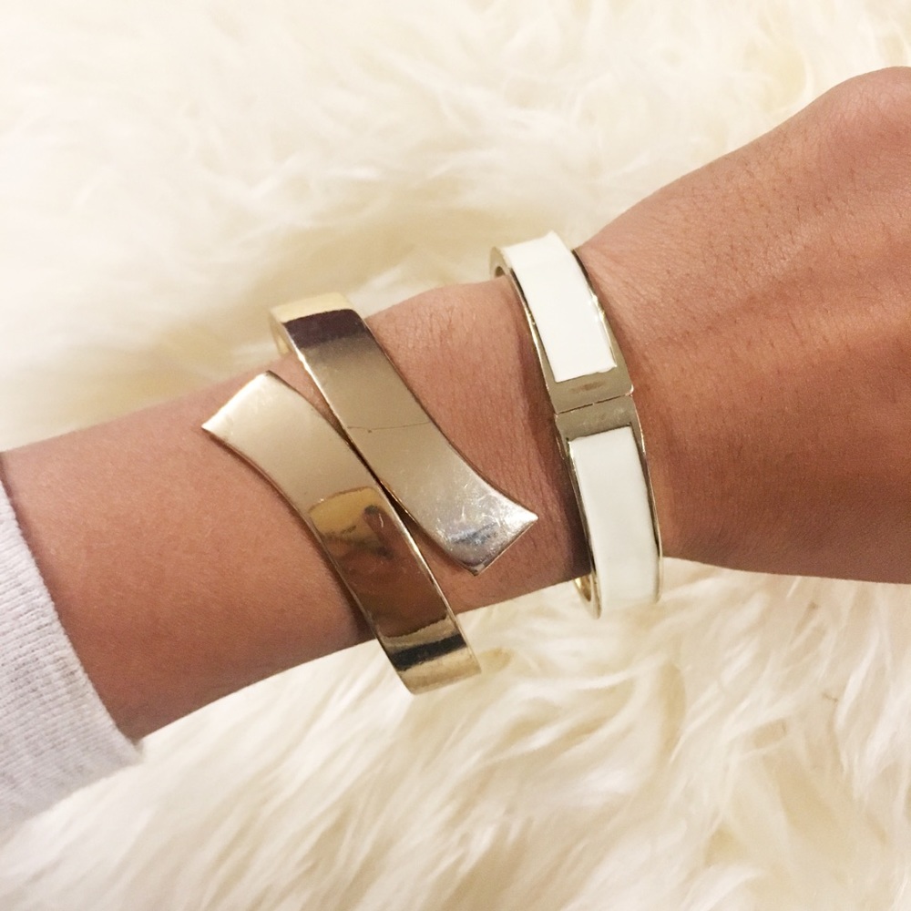 Gold and cream bracelets